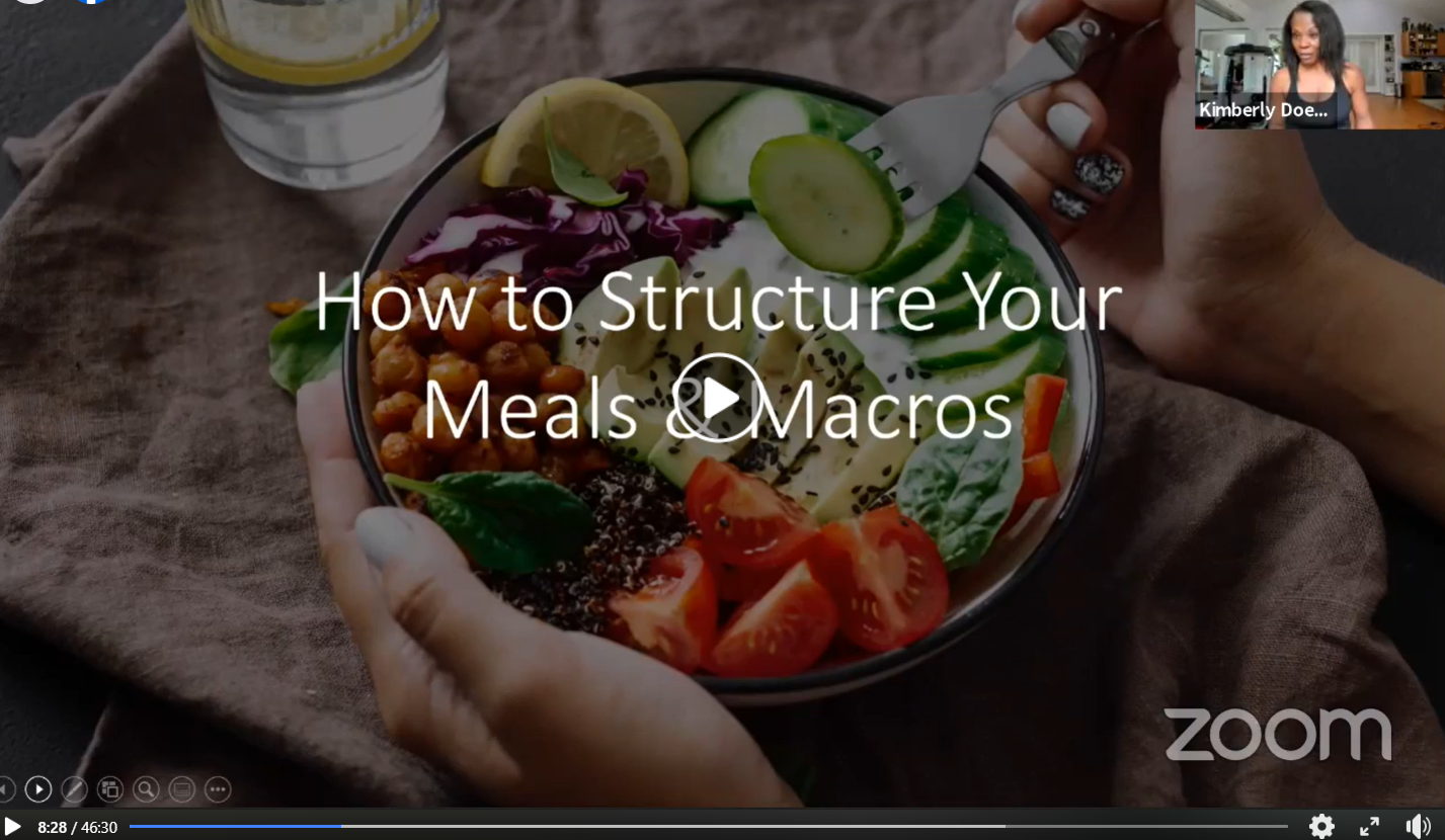 Screenshot from a training video titled 'How to Structure Your Meals & Macros' with a bowl of fresh food and a webcam view of the coach